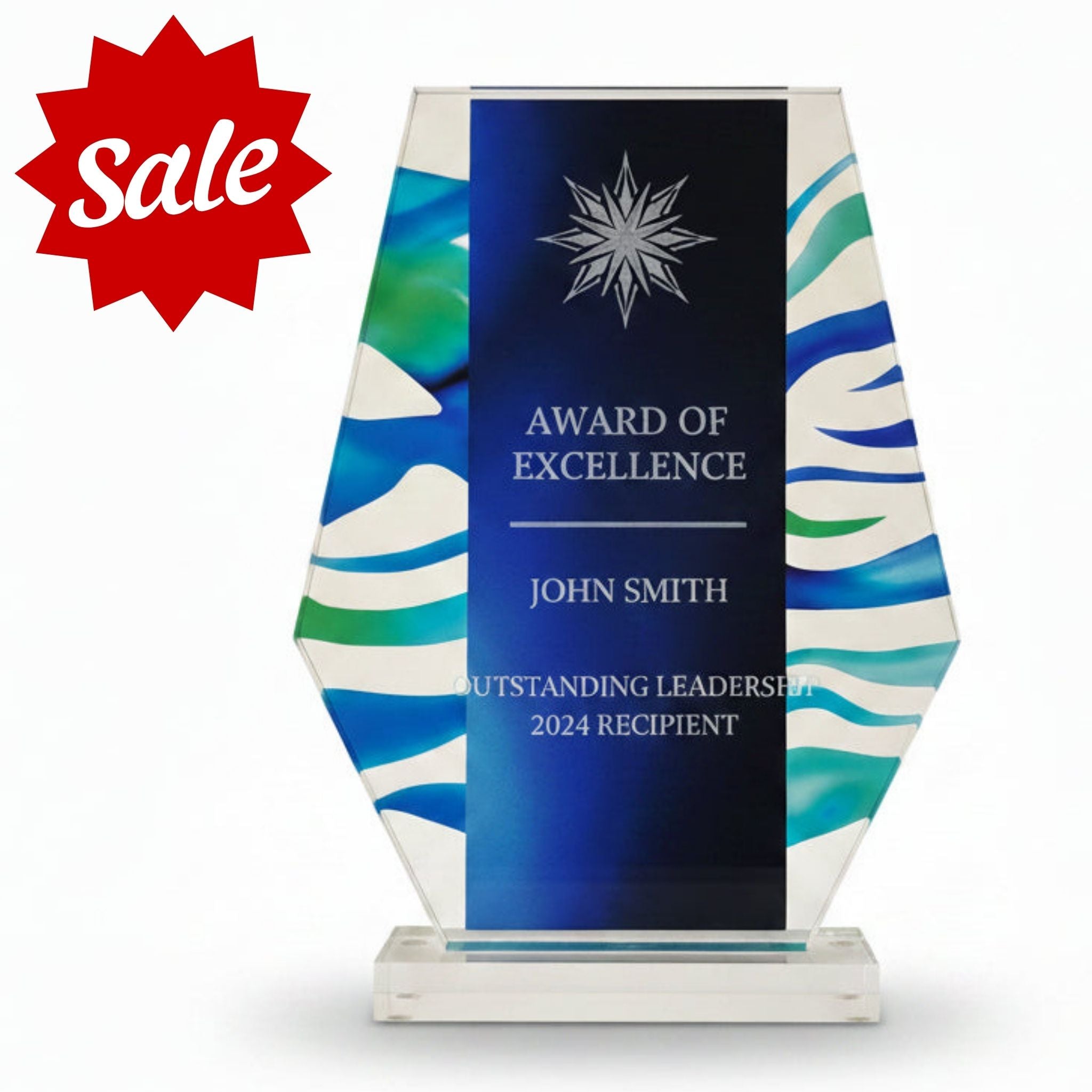 Decorative acrylic award with blue and green abstract design on a white background