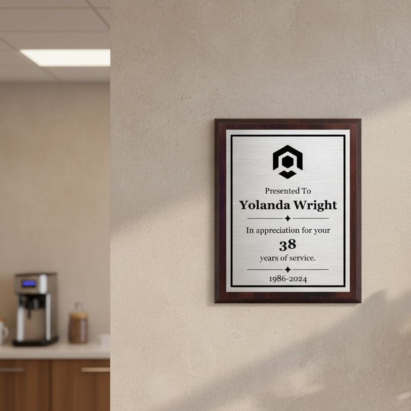 personalized walnut finish plaque with a silver and black engraved metal plate presented as an Appreciation Award