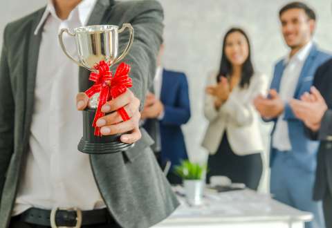 Employee receiving creative awards